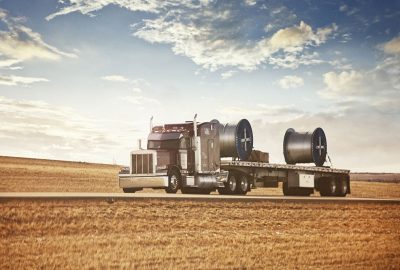 Semi-trailer truck on highway.Noise added.